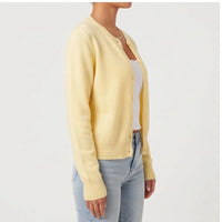 Model wearing S knit cardigan in a studio - 3