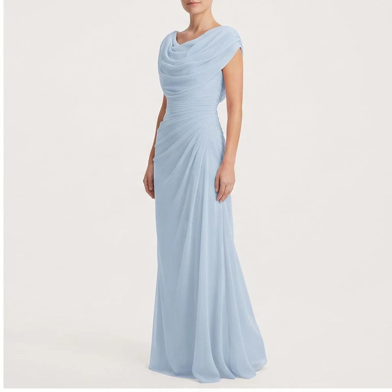 Model wearing Blue dress in a studio