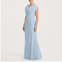 Model wearing Blue dress in a studio