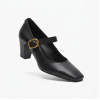 Black leather heels on a white background