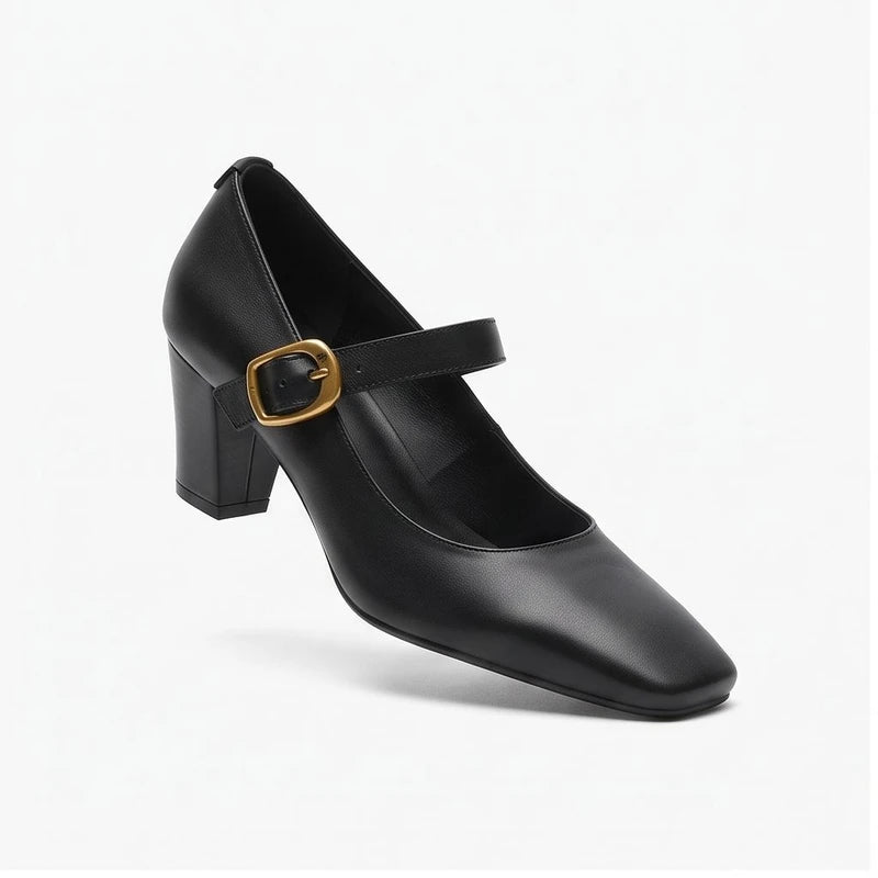 Black leather heels on a white background