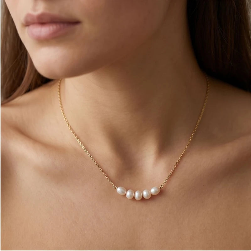 Model wearing Gold Aurea Pearl Necklace close-up - 2