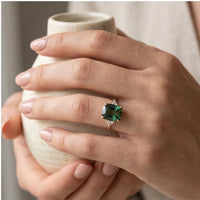 Model wearing 6 Vivienne Green Zirconia Gold Ring close-up - 4