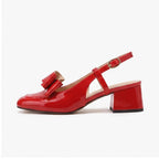 Red pumps on a white background - 2