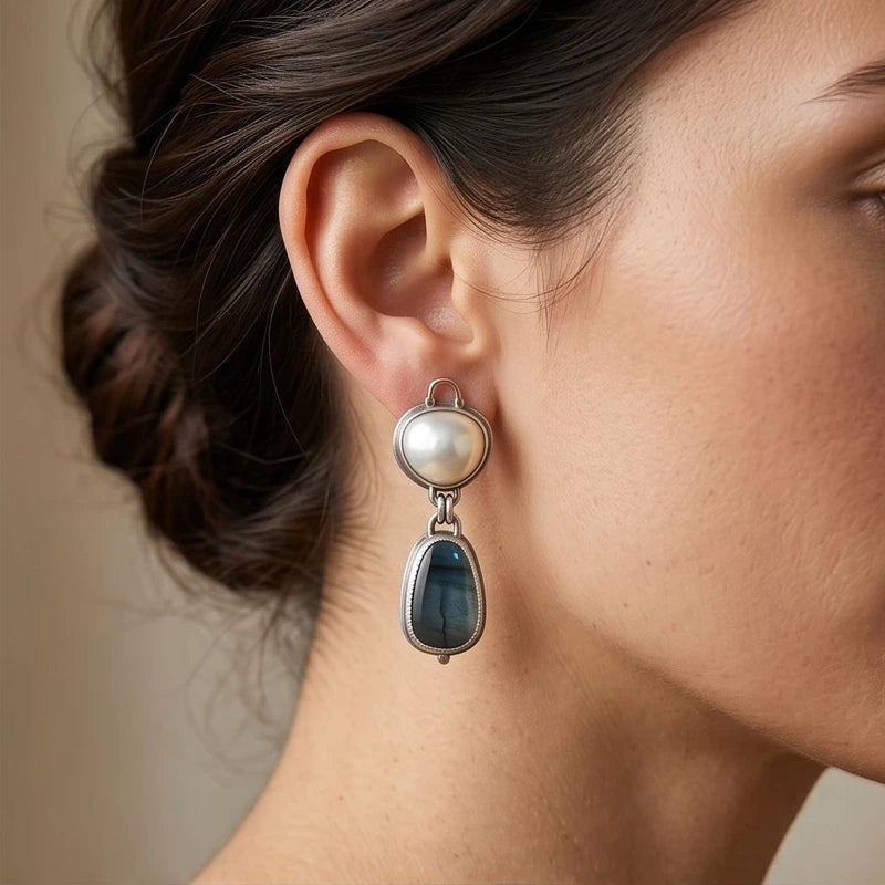 Model wearing Larimar Pearl Drop Blue Stone Earrings Larimar Pearl Drop Blue Stone Earrings close-up - 2