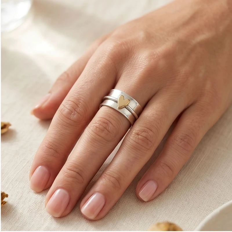 Model wearing 6 Solstice Sterling Silver Golden Heart Ring close-up - 2