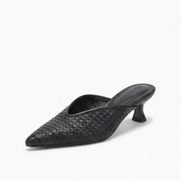 Black leather mules on a white background