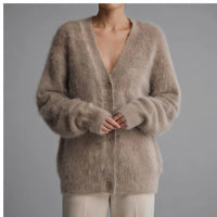 Model wearing Brown cashmere cardigan in a studio - 2