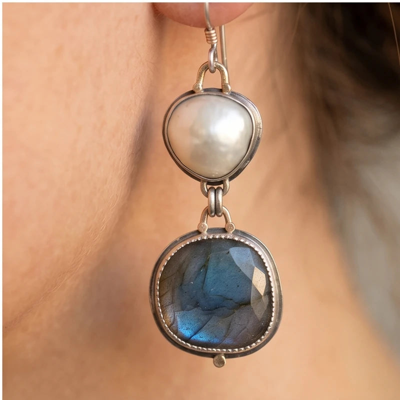 Model wearing Celeste Vintage Blue Gem & Pearl Drop Earrings Celeste Vintage Blue Gem & Pearl Drop Earrings close-up - 4