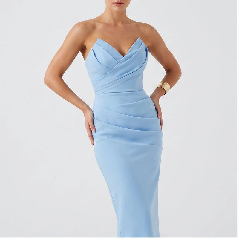 Model wearing Blue dress in a studio