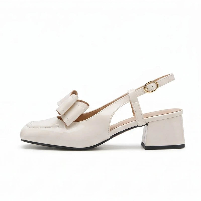 Ivory pumps on a white background - 2