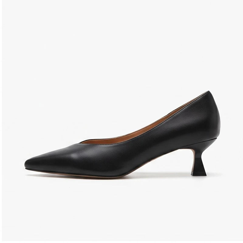 Black leather heels on a white background - 2