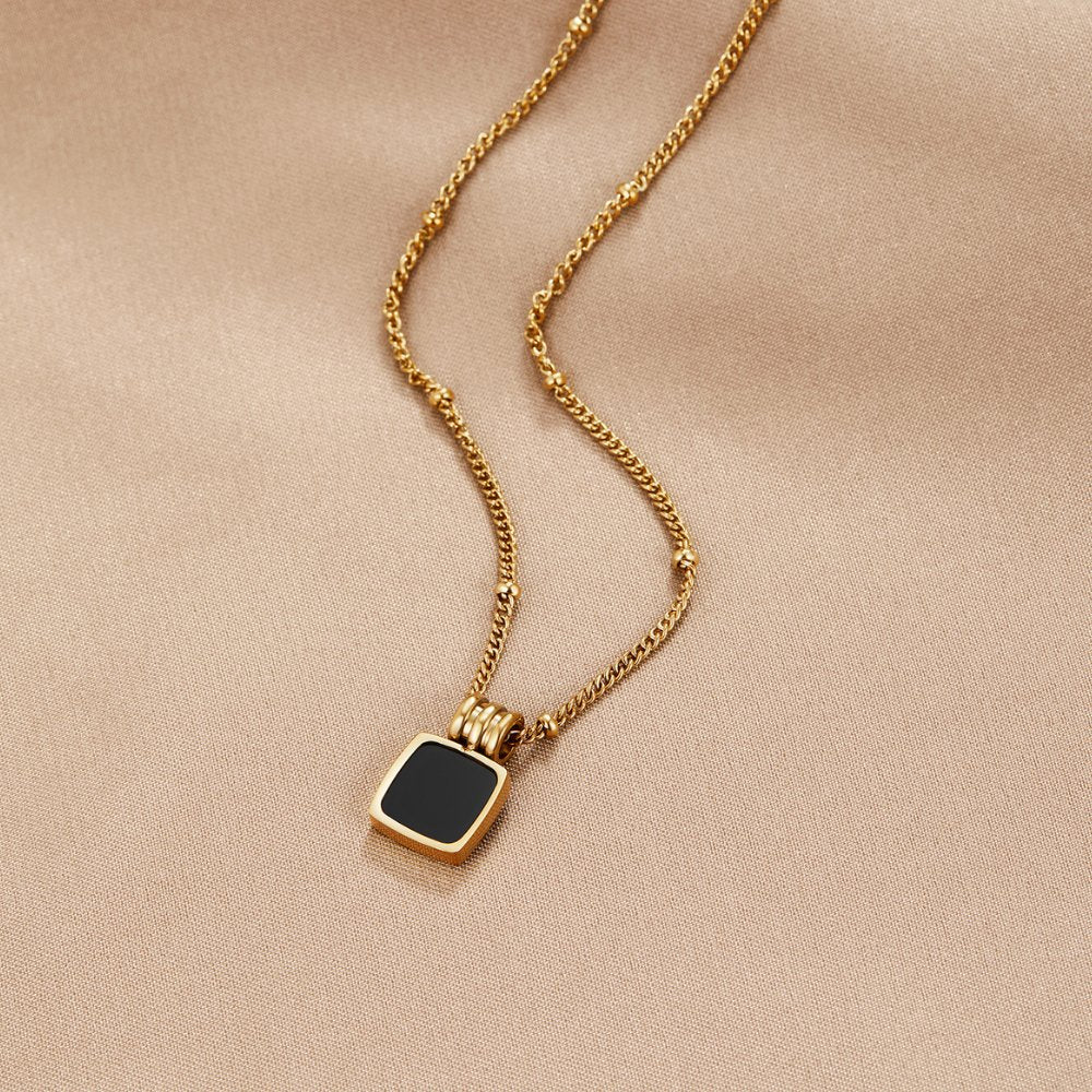 Solenne Gold Black Stone Pendant Necklace